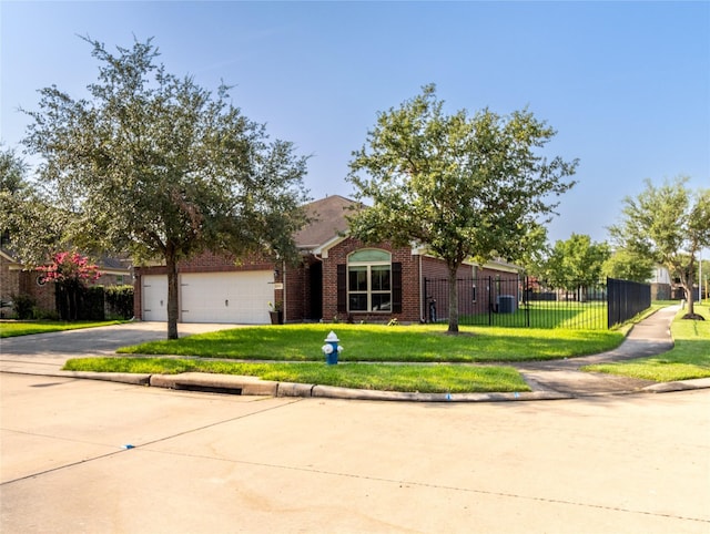 view of front of house with a front lawn and a garage