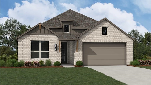 view of front of home featuring a front yard and a garage