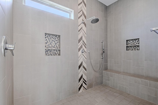 bathroom featuring tiled shower