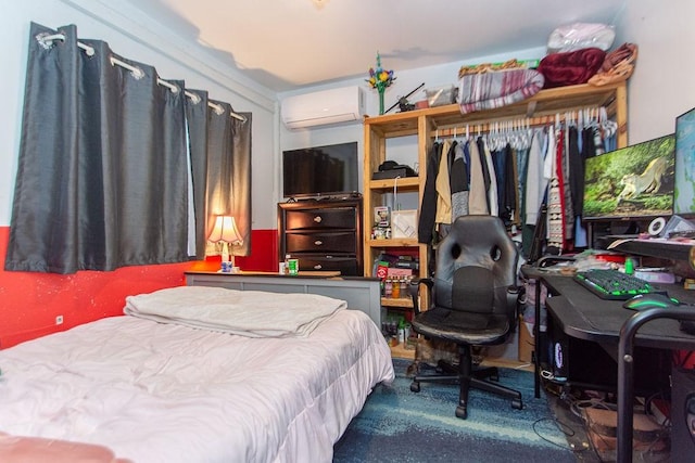 bedroom with a wall unit AC