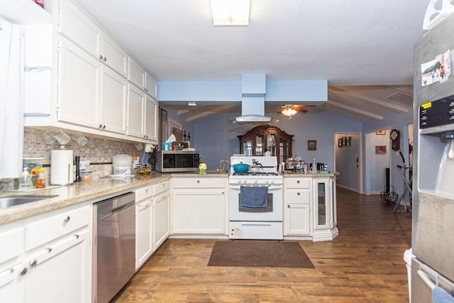 kitchen featuring kitchen peninsula, white cabinets, island range hood, and stainless steel appliances