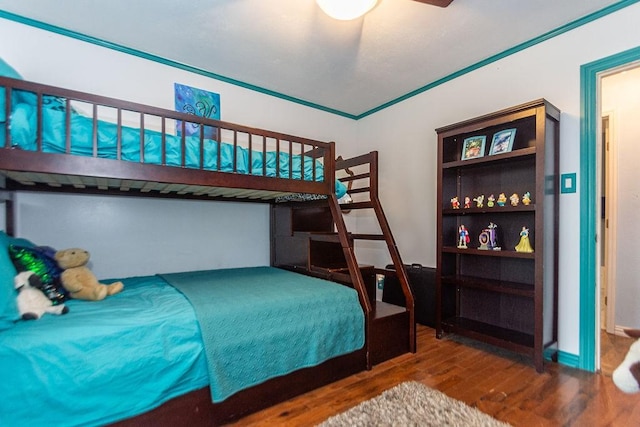 bedroom featuring ceiling fan and hardwood / wood-style floors