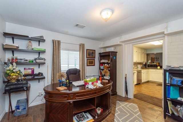 home office featuring hardwood / wood-style flooring