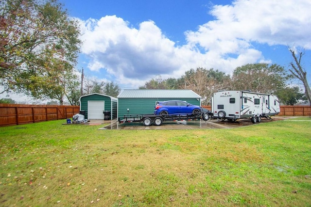 view of yard featuring a garage