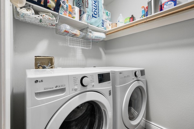 laundry room with washer and clothes dryer