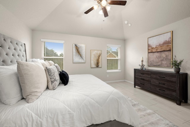 bedroom featuring ceiling fan and lofted ceiling