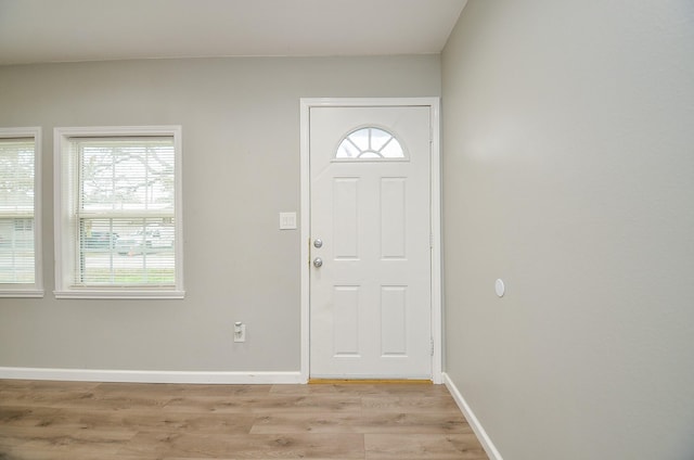 foyer with light hardwood / wood-style floors