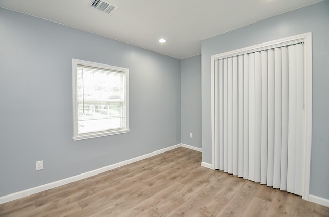 2706 Sledge St, Waller, TX 77484 - spare room with light wood finished floors, baseboards, and recessed lighting