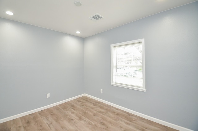 empty room with light wood-type flooring