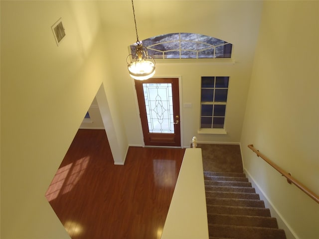 foyer with a towering ceiling