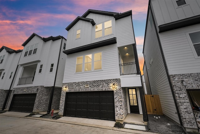 view of front of property with a garage