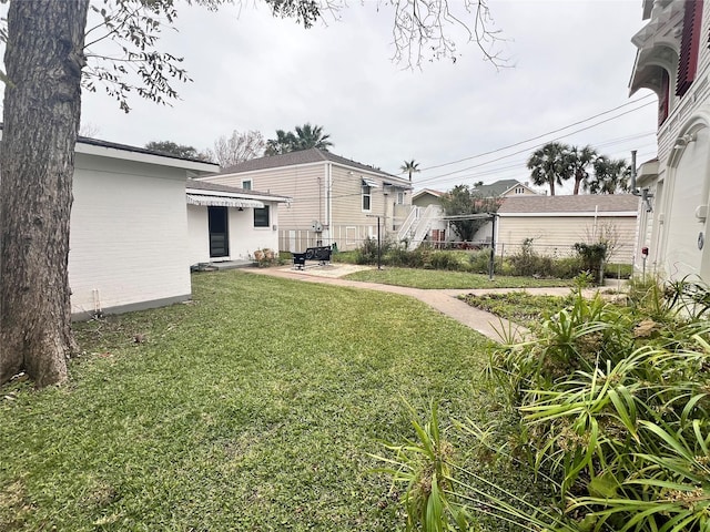 view of yard with a patio area and fence