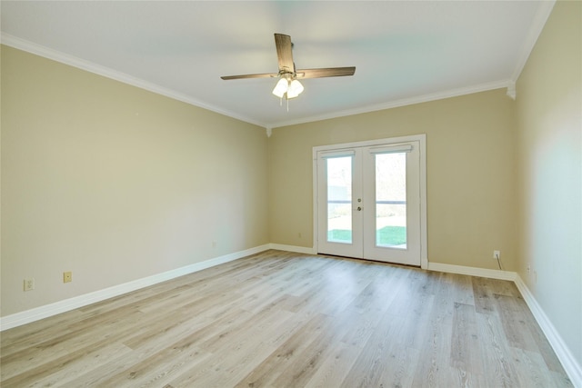 empty room featuring french doors, ceiling fan, crown molding, and light hardwood / wood-style flooring