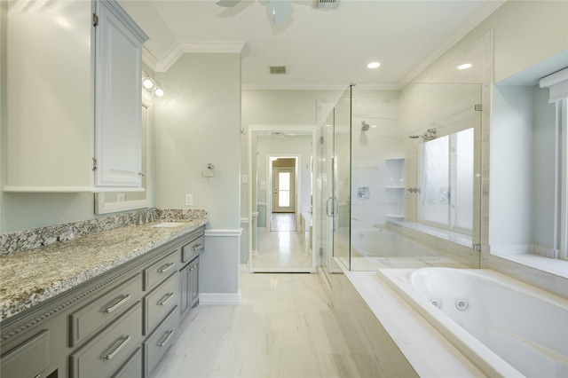 bathroom with ornamental molding, ceiling fan, plus walk in shower, and vanity