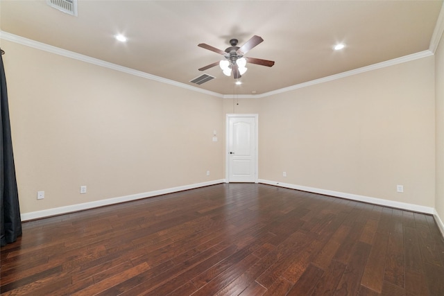 spare room featuring ceiling fan, dark hardwood / wood-style flooring, and crown molding