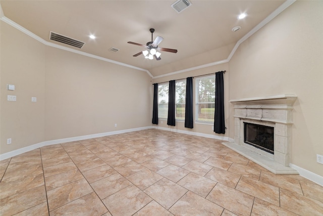 unfurnished living room with a tile fireplace, vaulted ceiling, light tile patterned flooring, ceiling fan, and ornamental molding