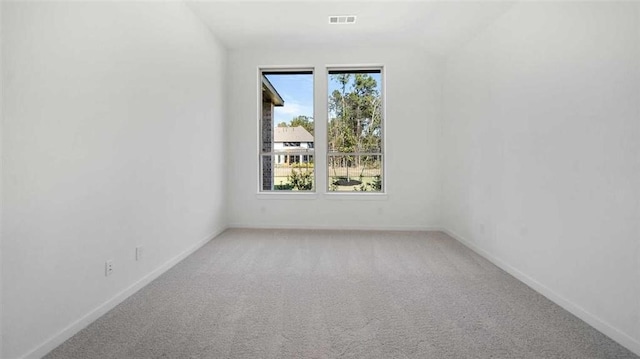 unfurnished room featuring carpet floors