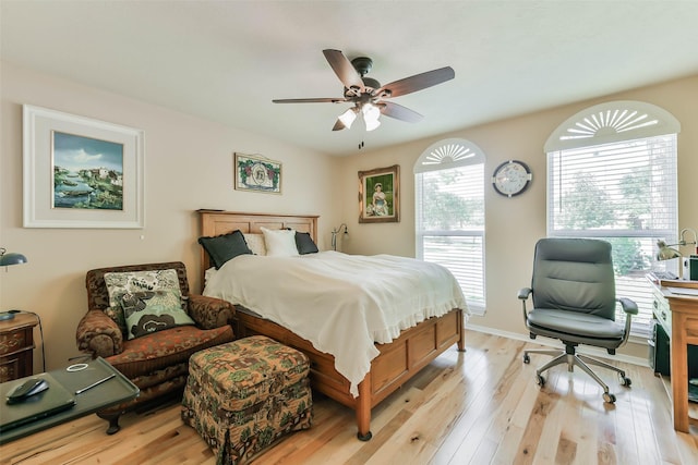 bedroom featuring ceiling fan and light hardwood / wood-style flooring