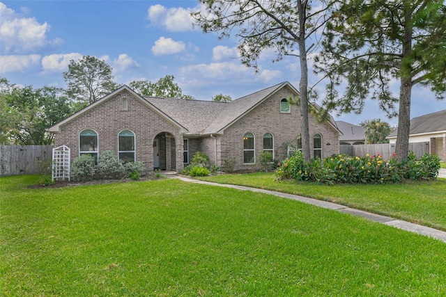 view of front of property with a front lawn