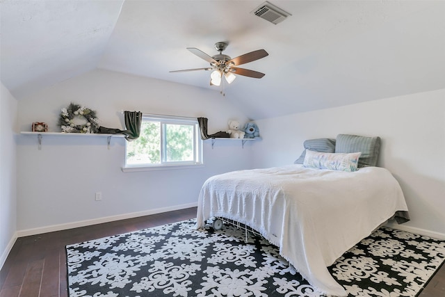 bedroom featuring lofted ceiling, ceiling fan, and dark hardwood / wood-style floors