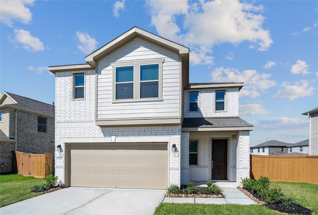 8203 Leisure Point Dr, Cypress, TX 77433 - view of front facade with brick siding, fence, concrete driveway, and a garage