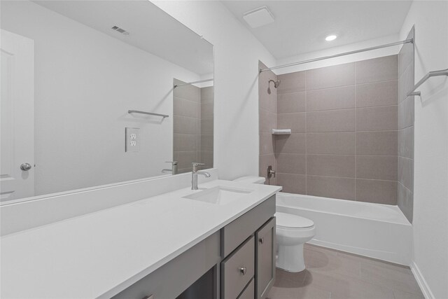 8203 Leisure Point Dr, Cypress, TX 77433 - bathroom featuring toilet, vanity, bathtub / shower combination, tile patterned flooring, and recessed lighting