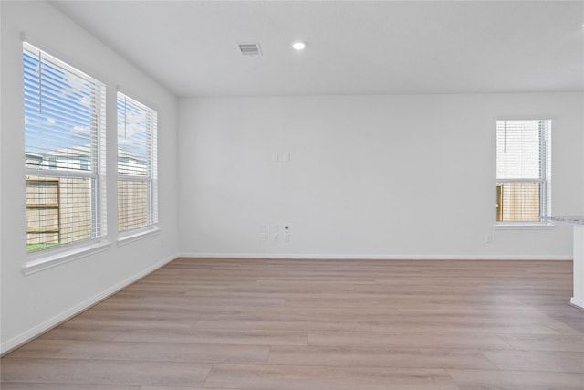 8203 Leisure Point Dr, Cypress, TX 77433 - spare room featuring light wood-type flooring, recessed lighting, and baseboards