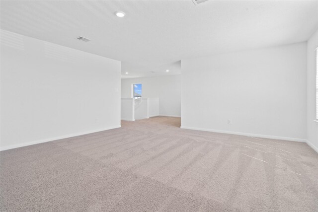 8203 Leisure Point Dr, Cypress, TX 77433 - spare room featuring light carpet, recessed lighting, and baseboards