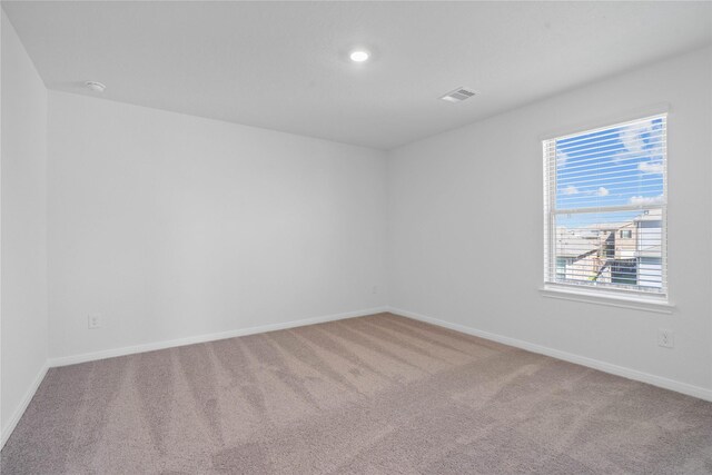 8203 Leisure Point Dr, Cypress, TX 77433 - carpeted spare room featuring baseboards and recessed lighting