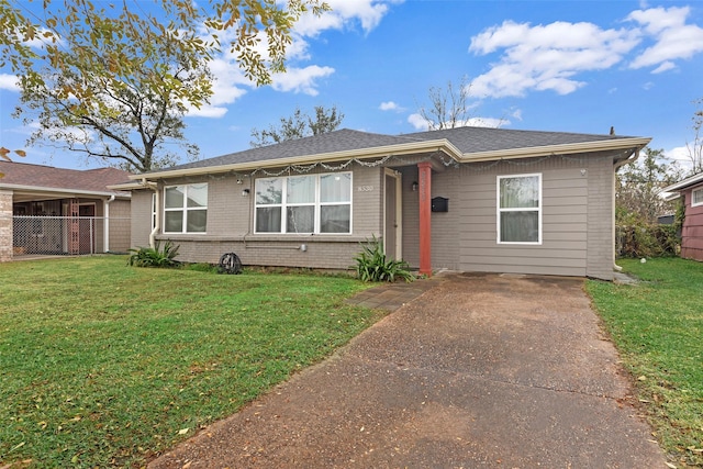 ranch-style house with a front yard