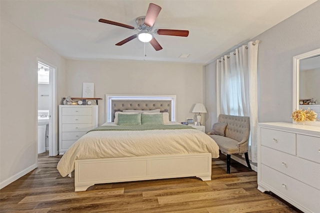 bedroom with ceiling fan and hardwood / wood-style floors