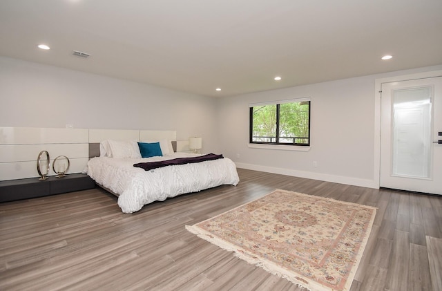 bedroom featuring wood-type flooring