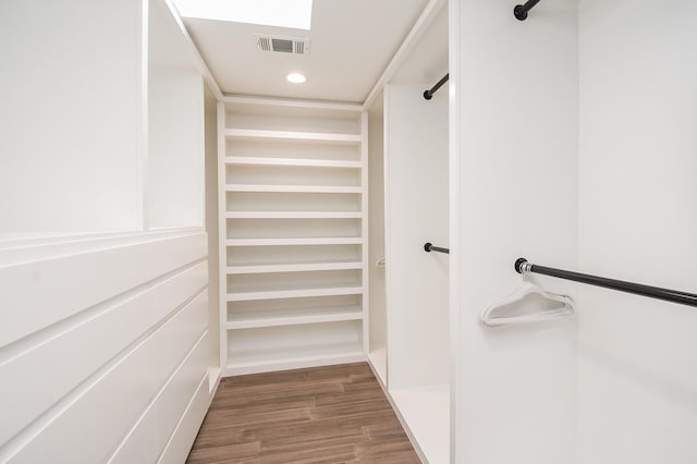 spacious closet featuring wood-type flooring