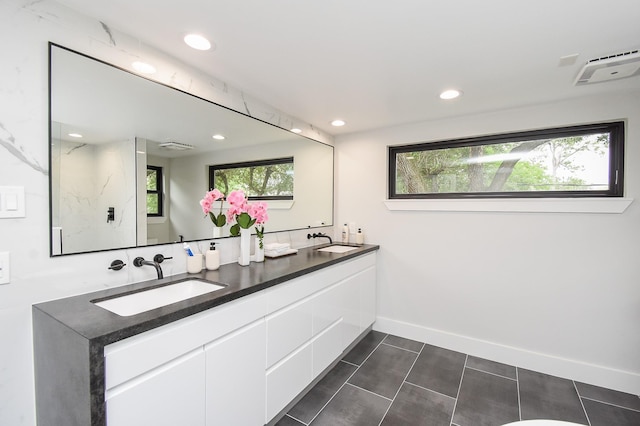 bathroom featuring vanity and tile patterned floors