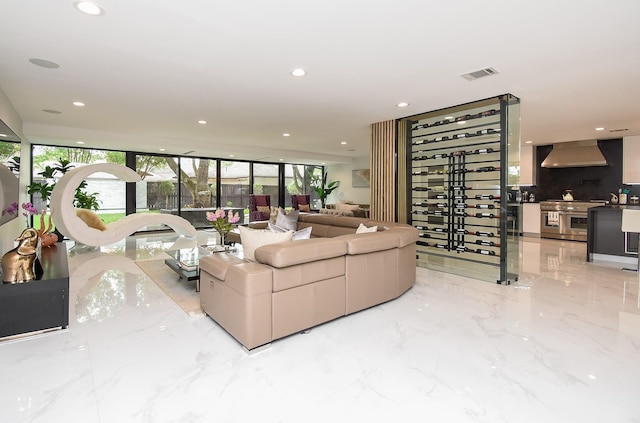 living room with floor to ceiling windows