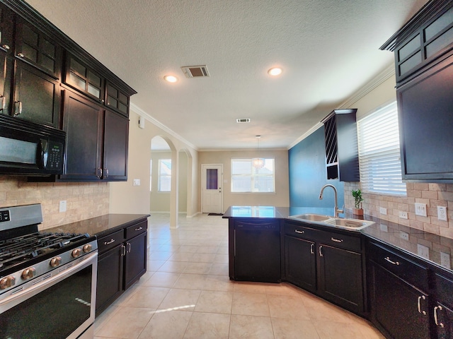 kitchen featuring black appliances, decorative light fixtures, sink, ornamental molding, and light tile patterned flooring