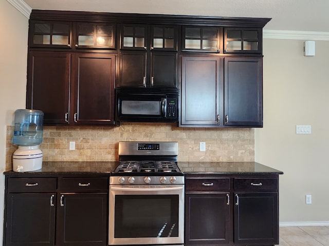 kitchen with stainless steel range with gas cooktop, crown molding, dark brown cabinets, and light tile patterned flooring