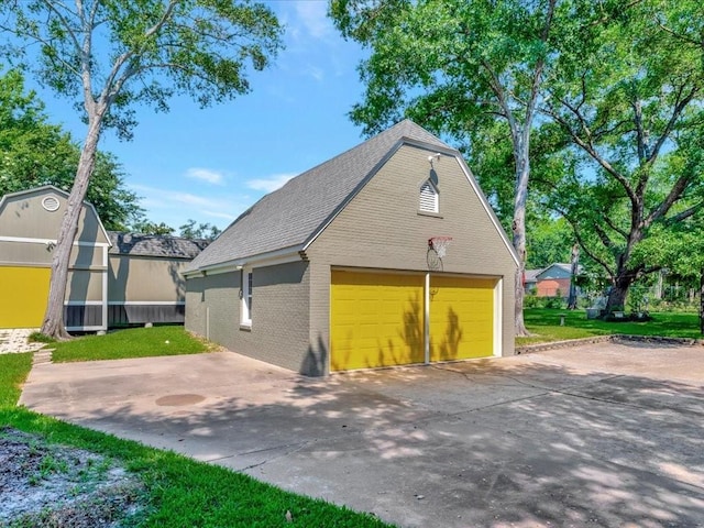 view of side of home with a garage