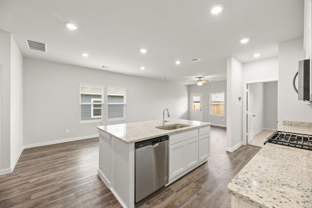 kitchen featuring recessed lighting, a sink, visible vents, dishwasher, and white cabinets
