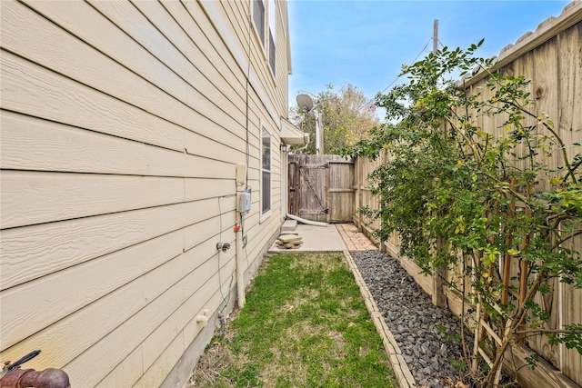 1211 Ennis St, Houston, TX 77003 - view of side of home with fence and a gate