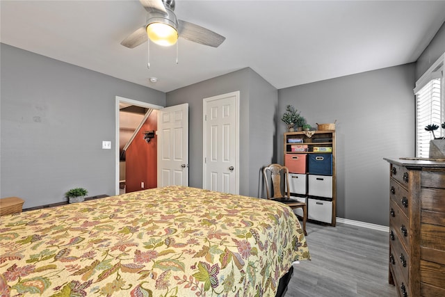 1211 Ennis St, Houston, TX 77003 - bedroom with wood finished floors, baseboards, ceiling fan, and a closet