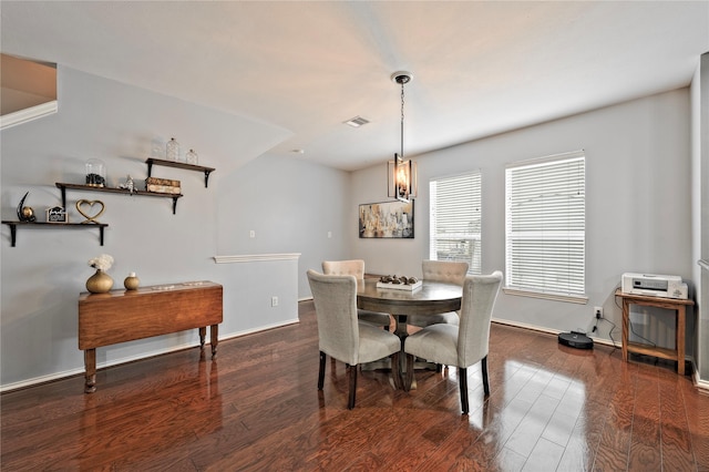 1211 Ennis St, Houston, TX 77003 - dining area with wood finished floors and baseboards