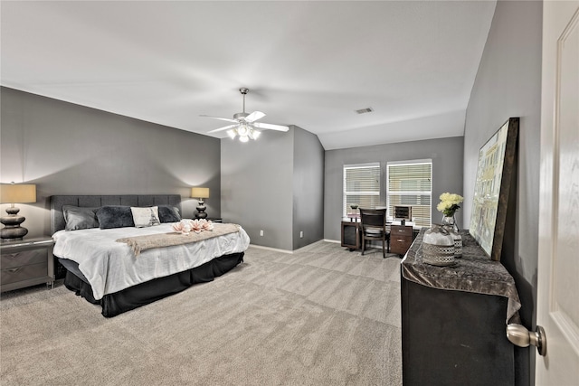 1211 Ennis St, Houston, TX 77003 - bedroom with lofted ceiling, a desk, light colored carpet, baseboards, and ceiling fan
