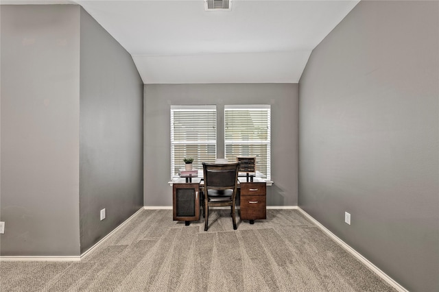 1211 Ennis St, Houston, TX 77003 - carpeted home office featuring lofted ceiling and baseboards