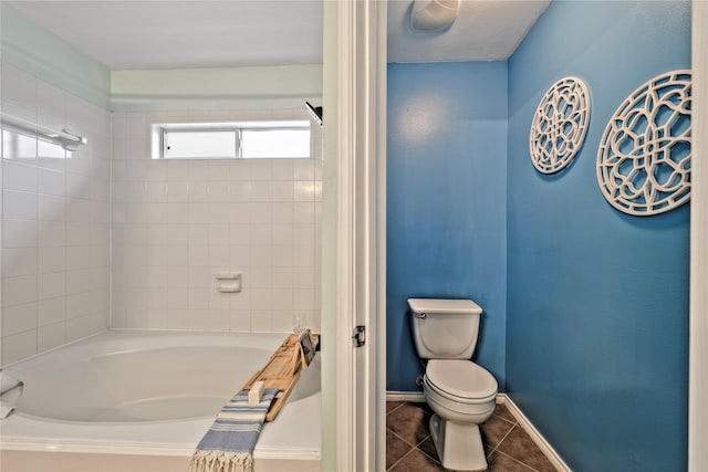 bathroom with tile patterned floors and toilet