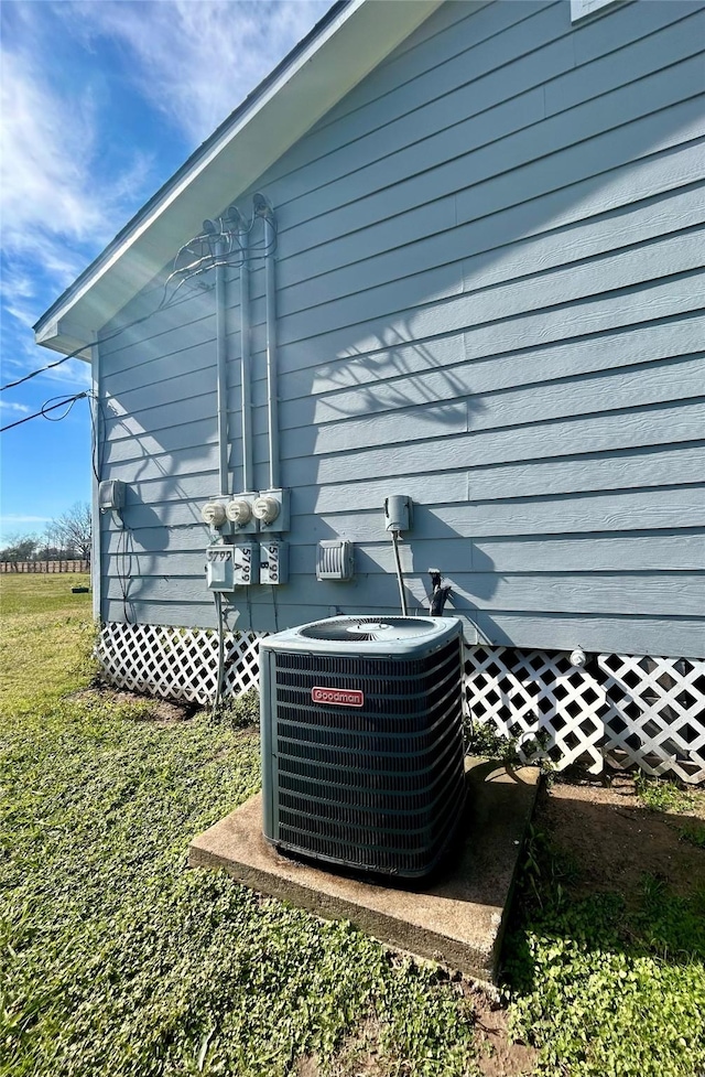 exterior details featuring cooling unit