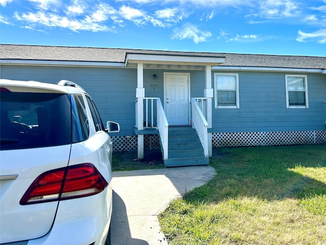 view of front of house with a front yard