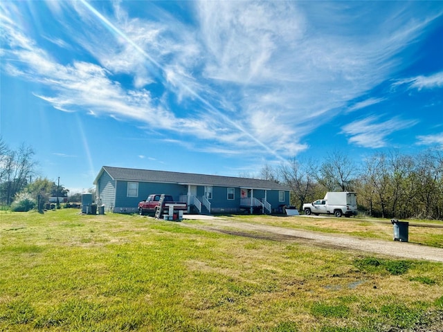 single story home featuring a front yard