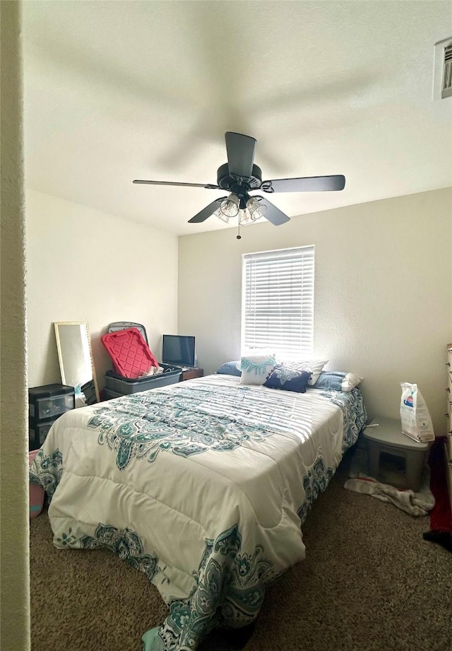 carpeted bedroom with ceiling fan