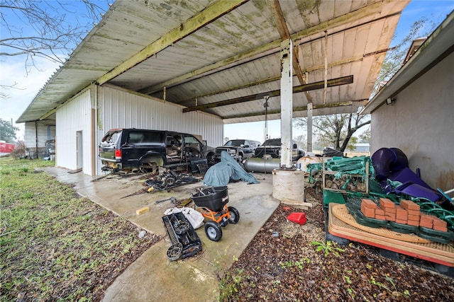 exterior space with a carport